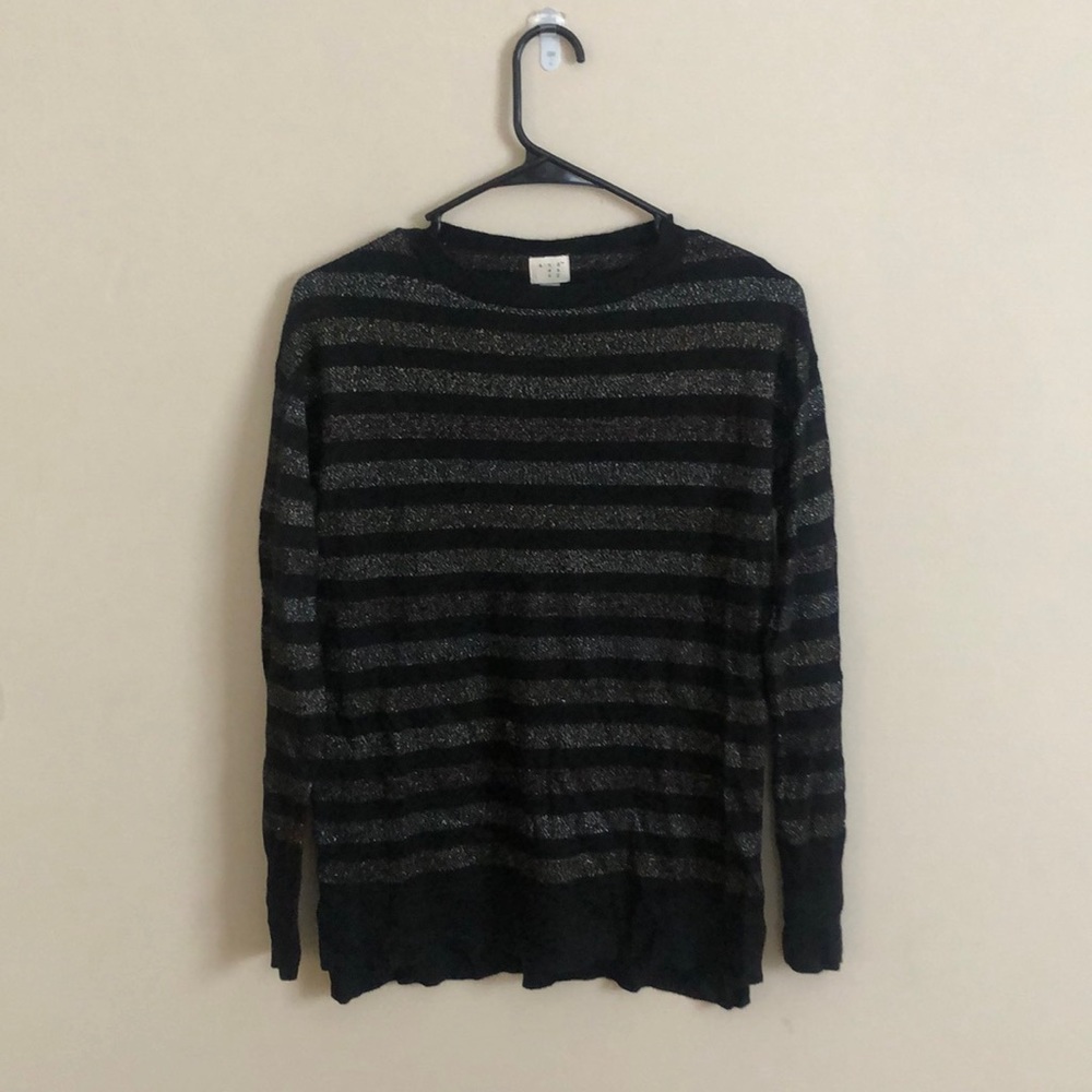 Lightly worn, size small, black with sparkly stripes sweater